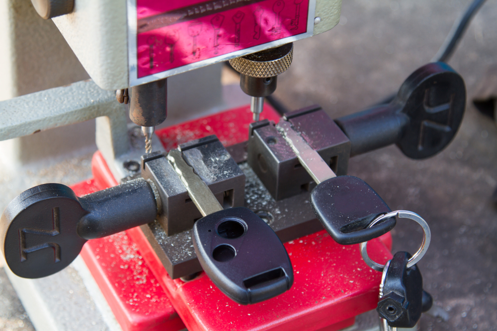Key cutting machine making a replacement key